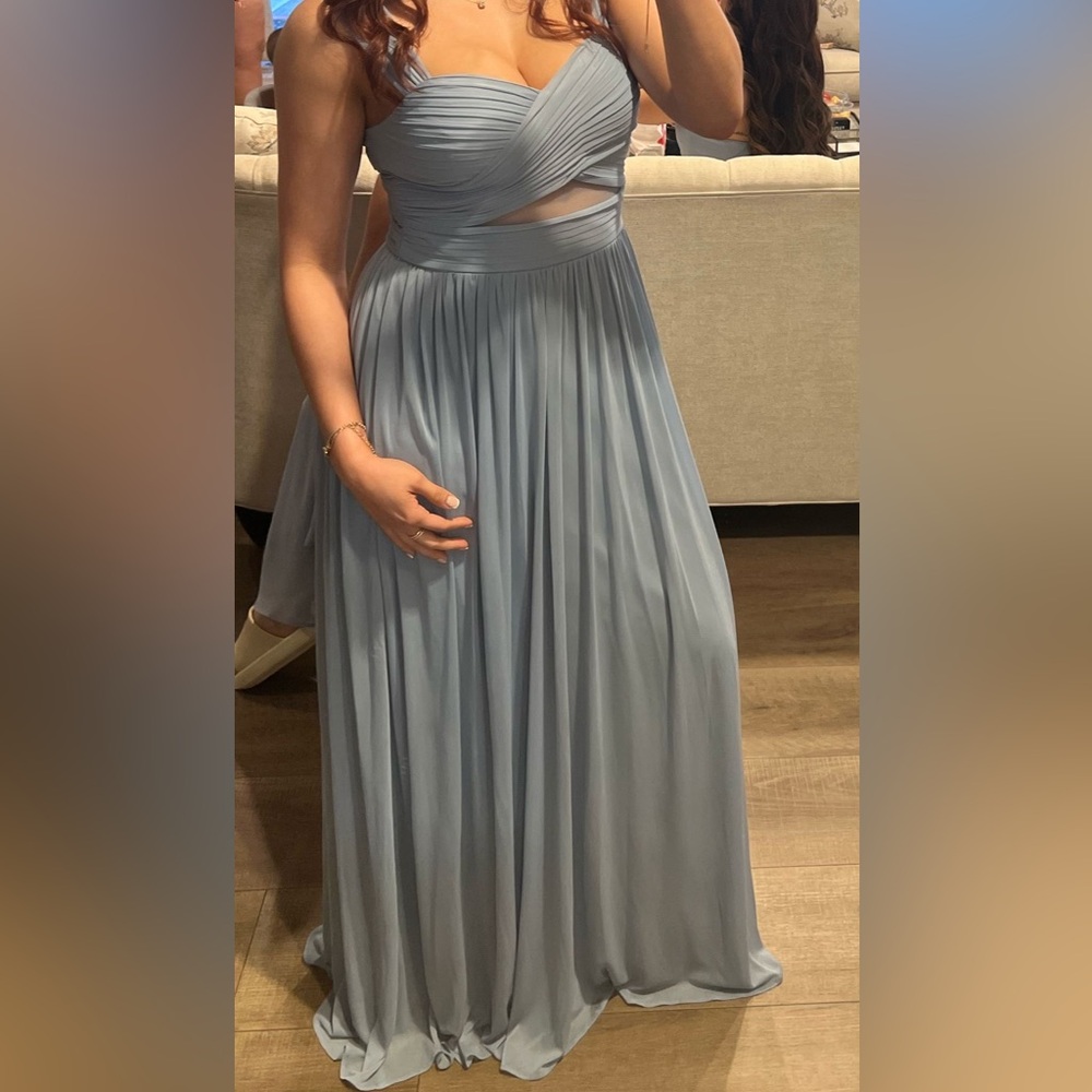 A modern bridesmaid dress with peekaboo mesh cutouts.
WORN ONCE. Great condition